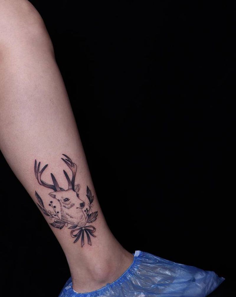 福禄纹身图片_腿部点刺纹身图案