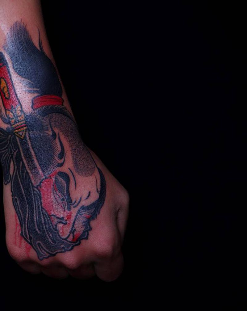 生首纹身图片_手部新传统纹身图案