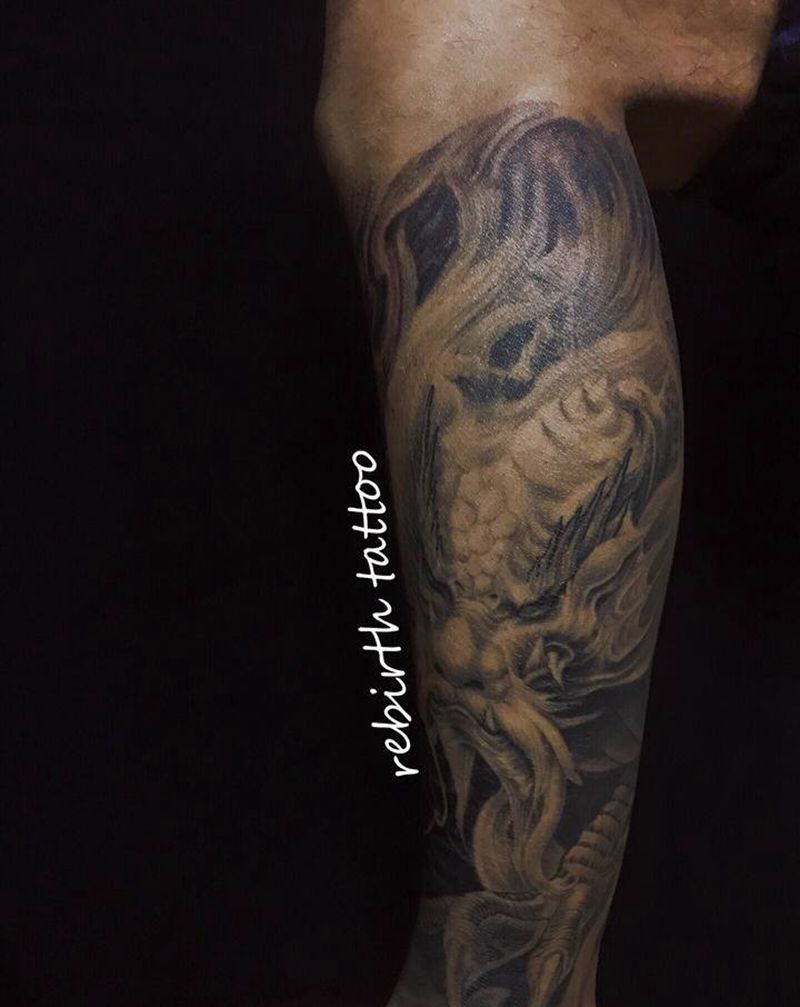 临摹岳老师龙炽水平有限纹身图片_腿部新传统欧美写实纹身图案