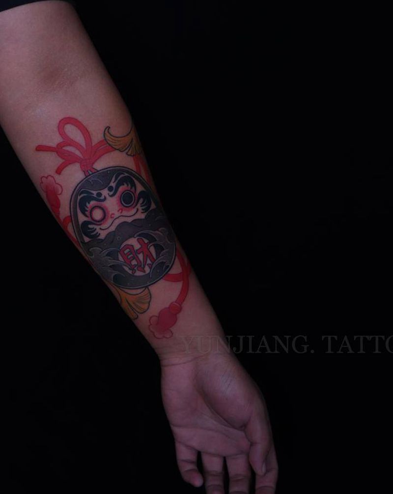 达摩蛋纹身图片_手臂纹身图案