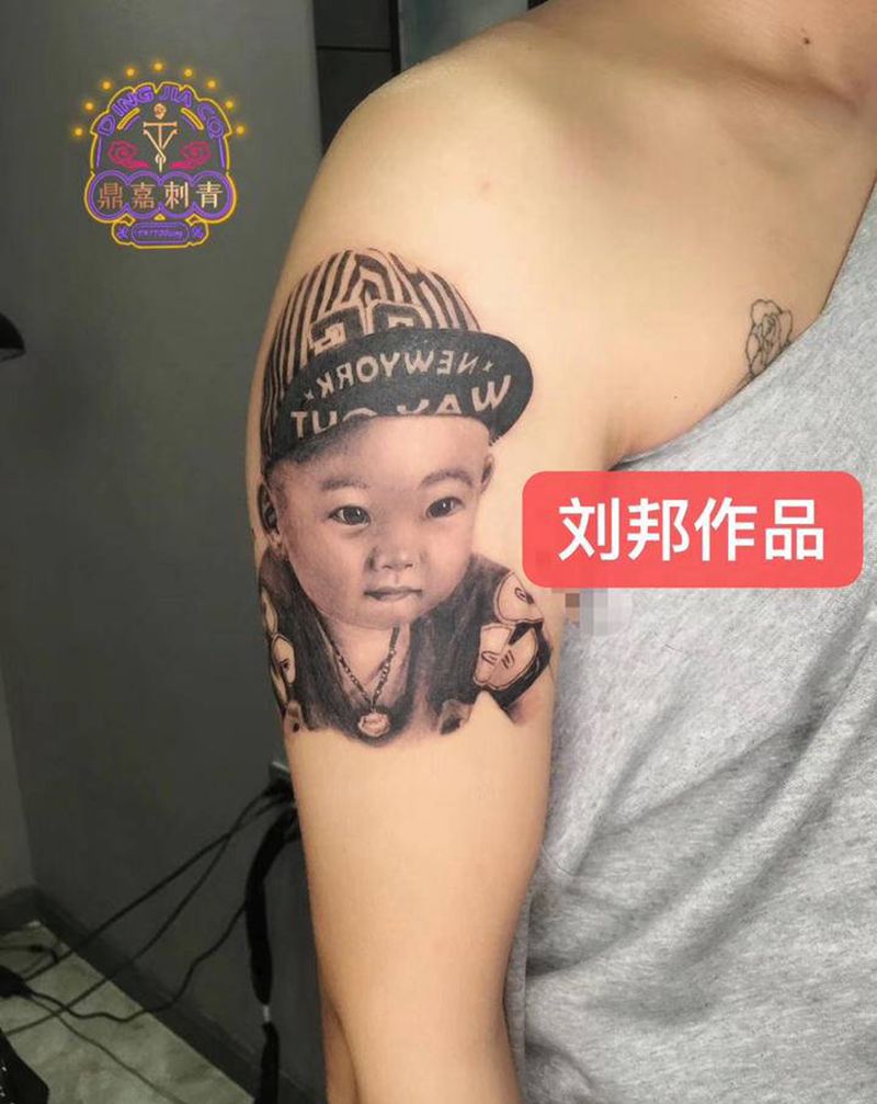 照片肖像纹身图片_手臂欧美写实纹身图案