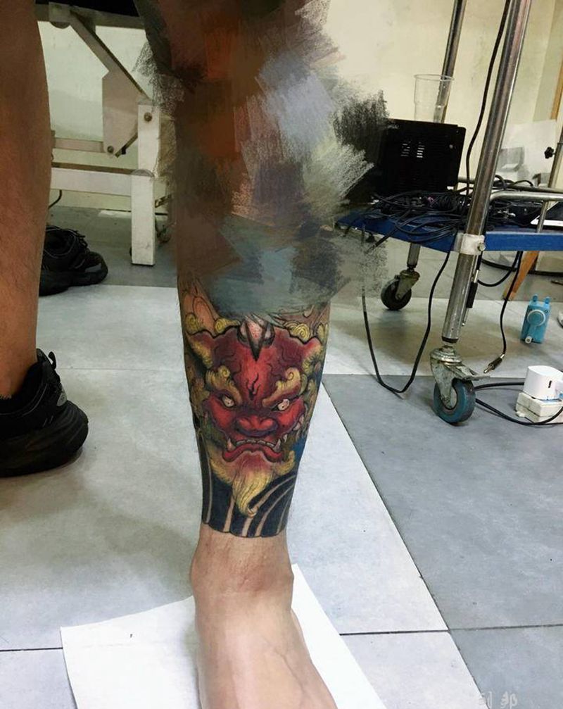 唐狮纹身图片_腿部纹身图案