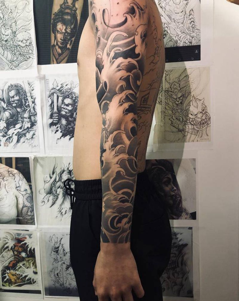 浪臂纹身图片_手臂新传统纹身图案