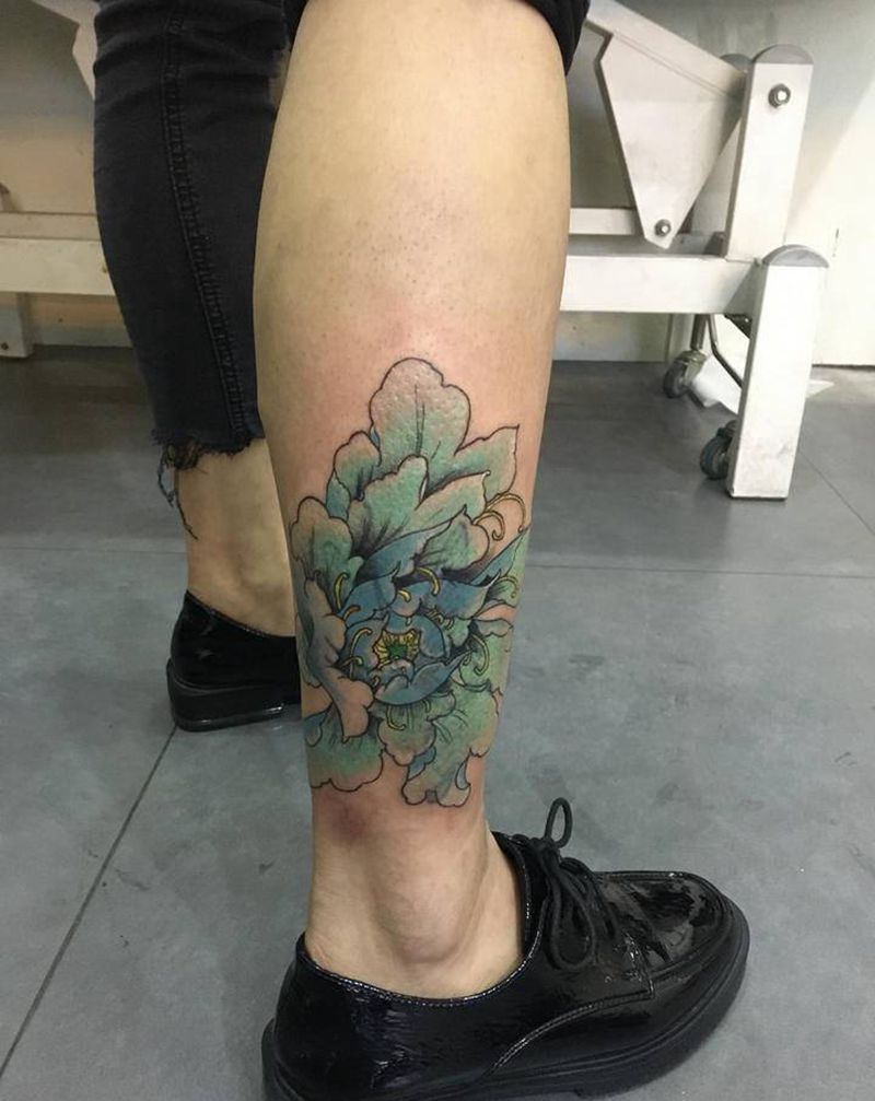 传统荷花遮盖纹身图片_腿部纹身图案