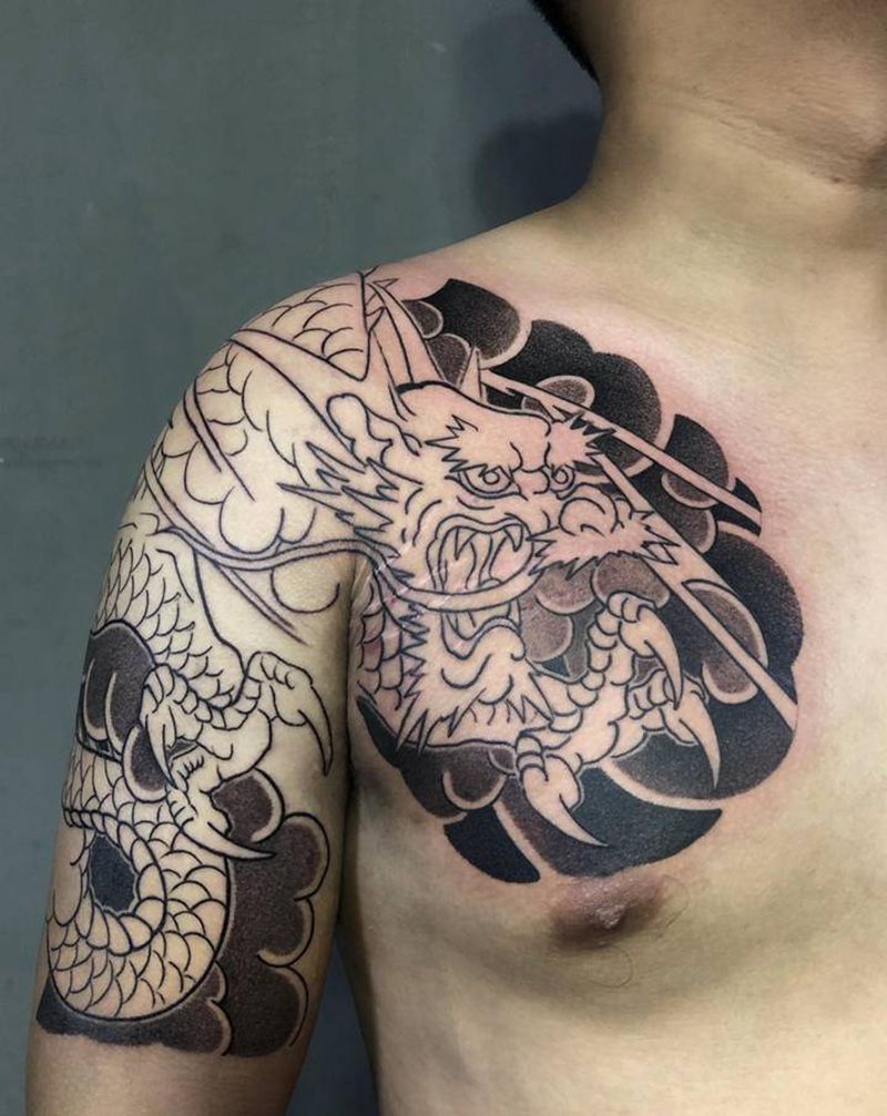 老传统龙未完纹身图片_肩部手臂老传统新传统纹身图案