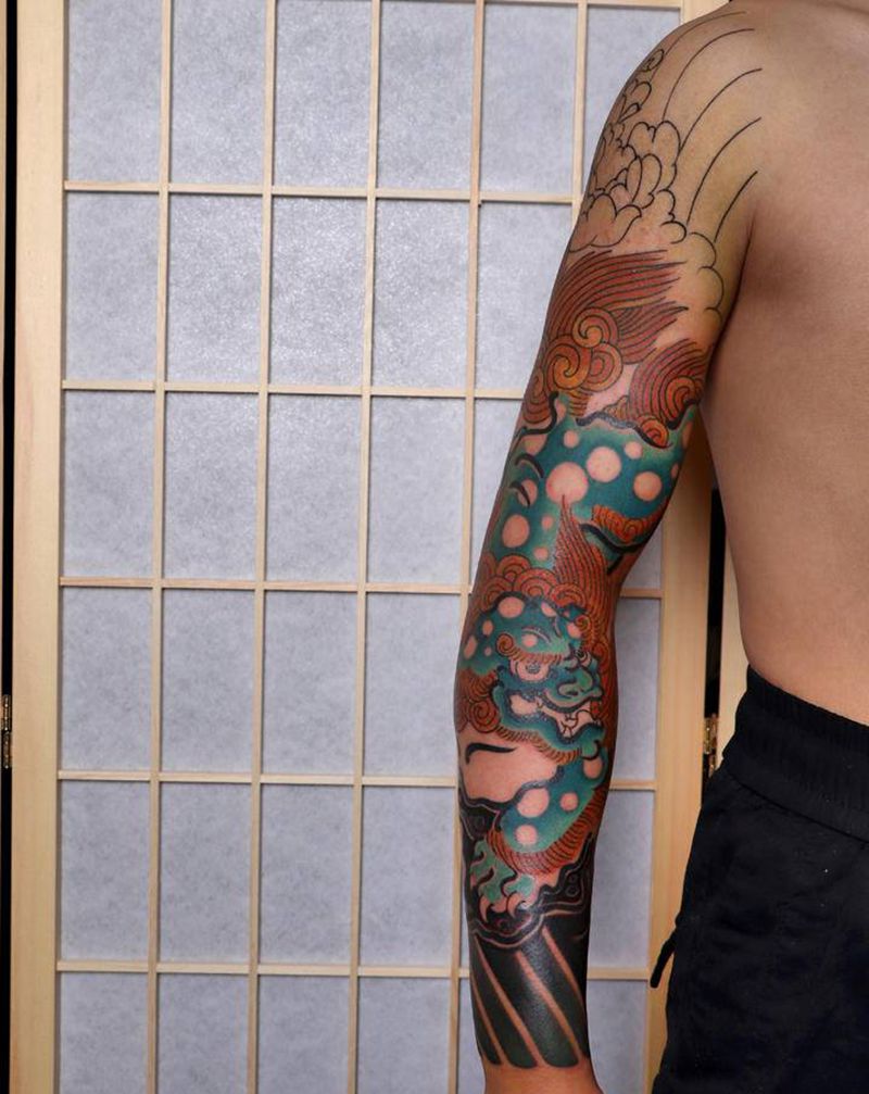 唐狮纹身图片_手臂老传统纹身图案