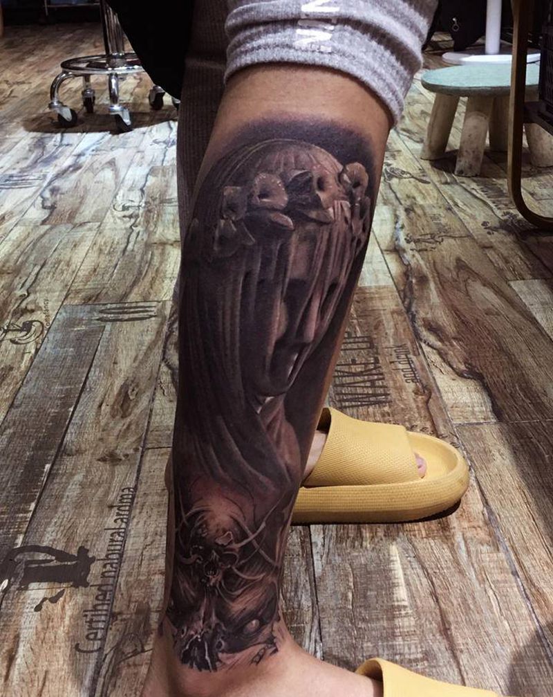 写实纹身图片_腿部纹身图案