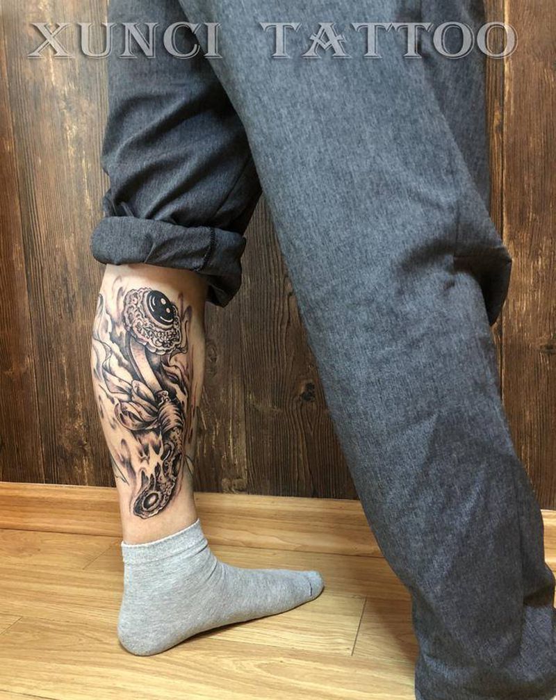 如意纹身图片_腿部老传统纹身图案