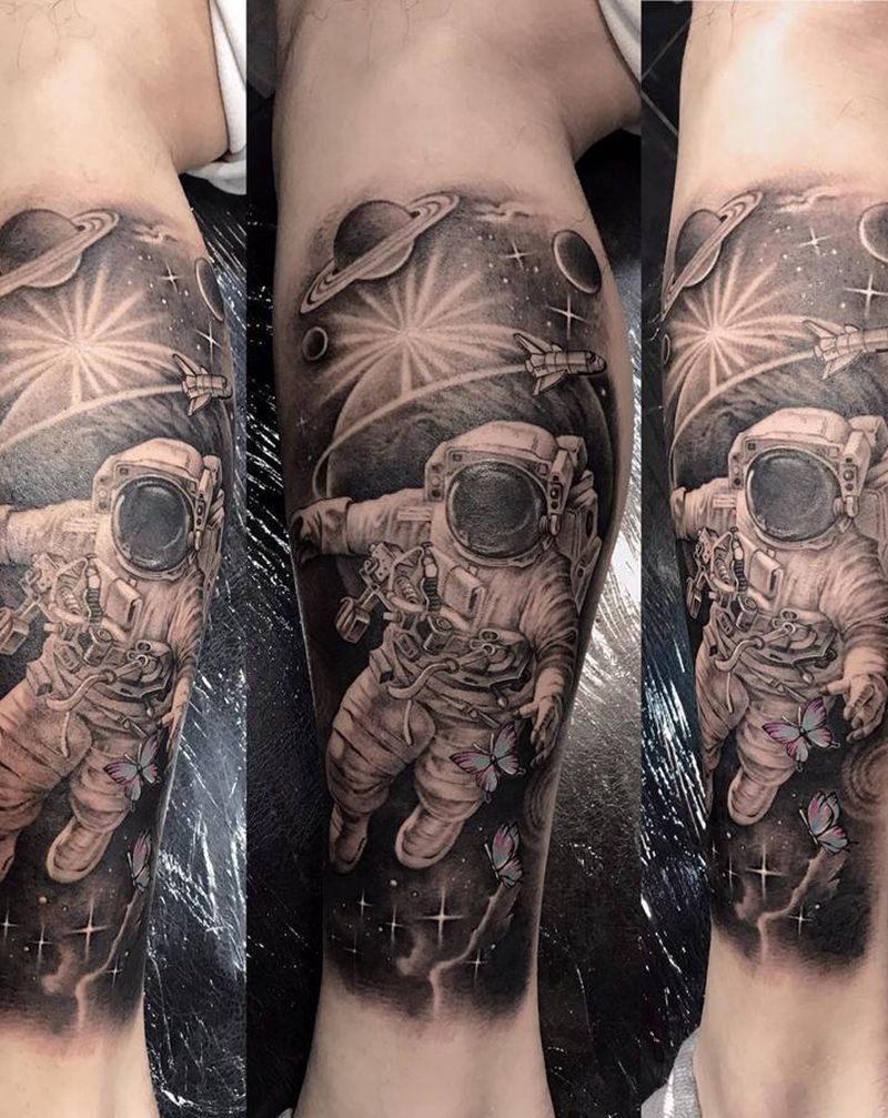 太空中的宇航员纹身图片_腿部欧美写实纹身图案