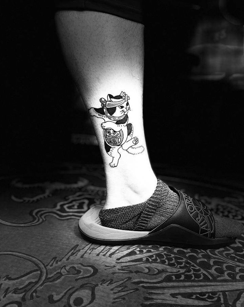 日式小图纹身图片_腿部老传统纹身图案