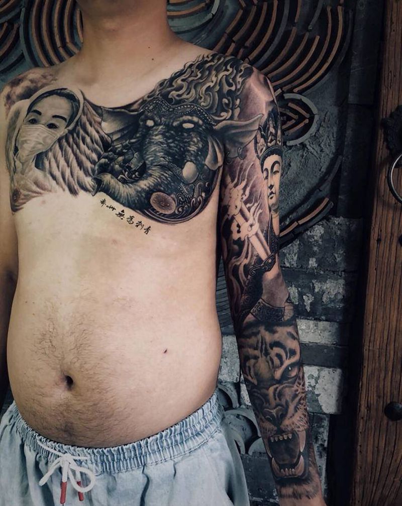 虚空藏菩萨纹身图片_手臂新传统欧美写实虚空藏菩萨象神遮盖老虎纹身图案