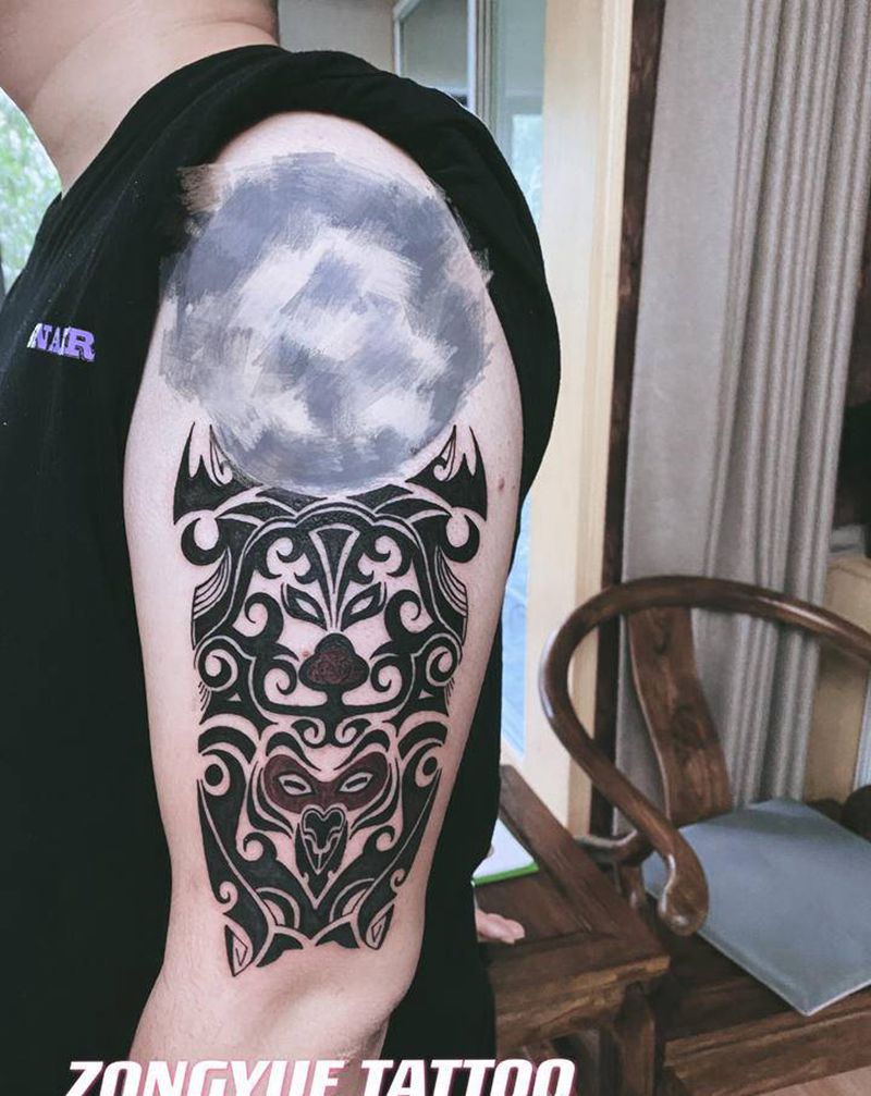 图腾纹身图片_手臂图腾猴猪纹身图案