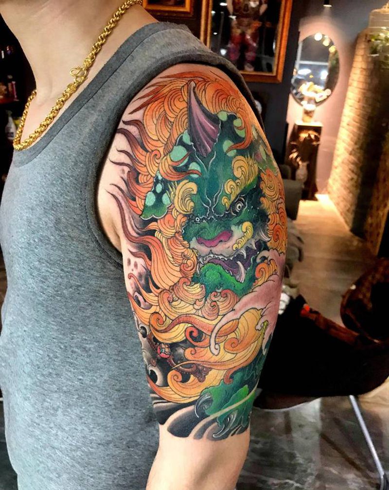 谛听纹身图片_手臂新传统纹身图案