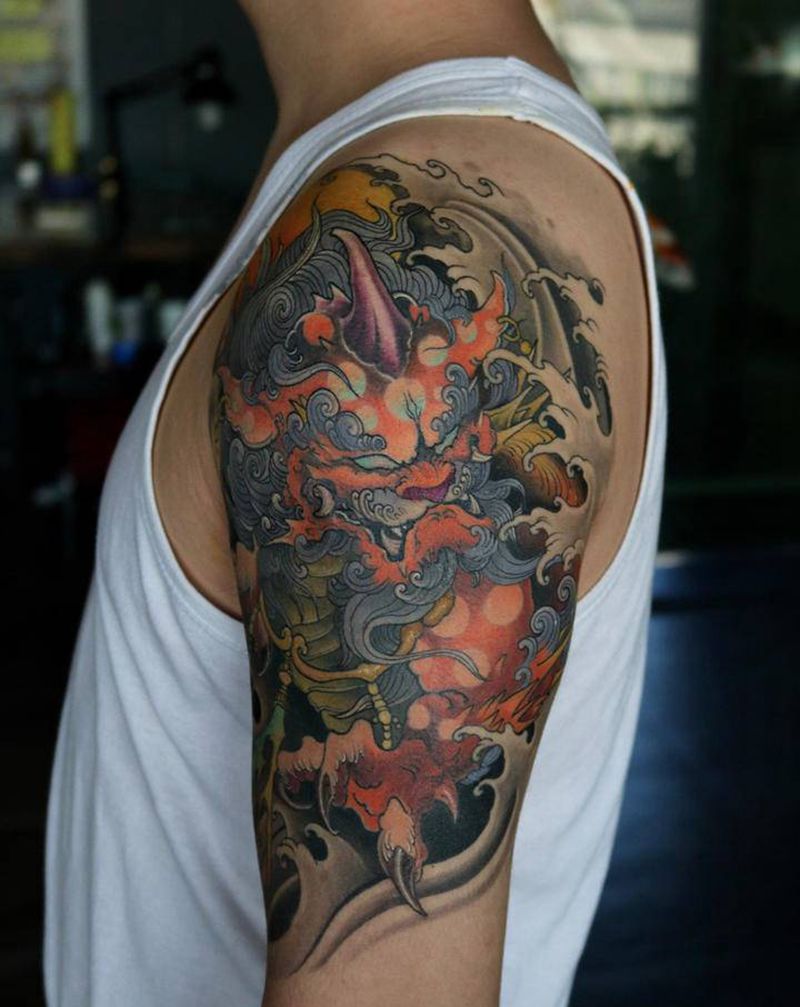 谛听纹身图片_手臂新传统纹身图案