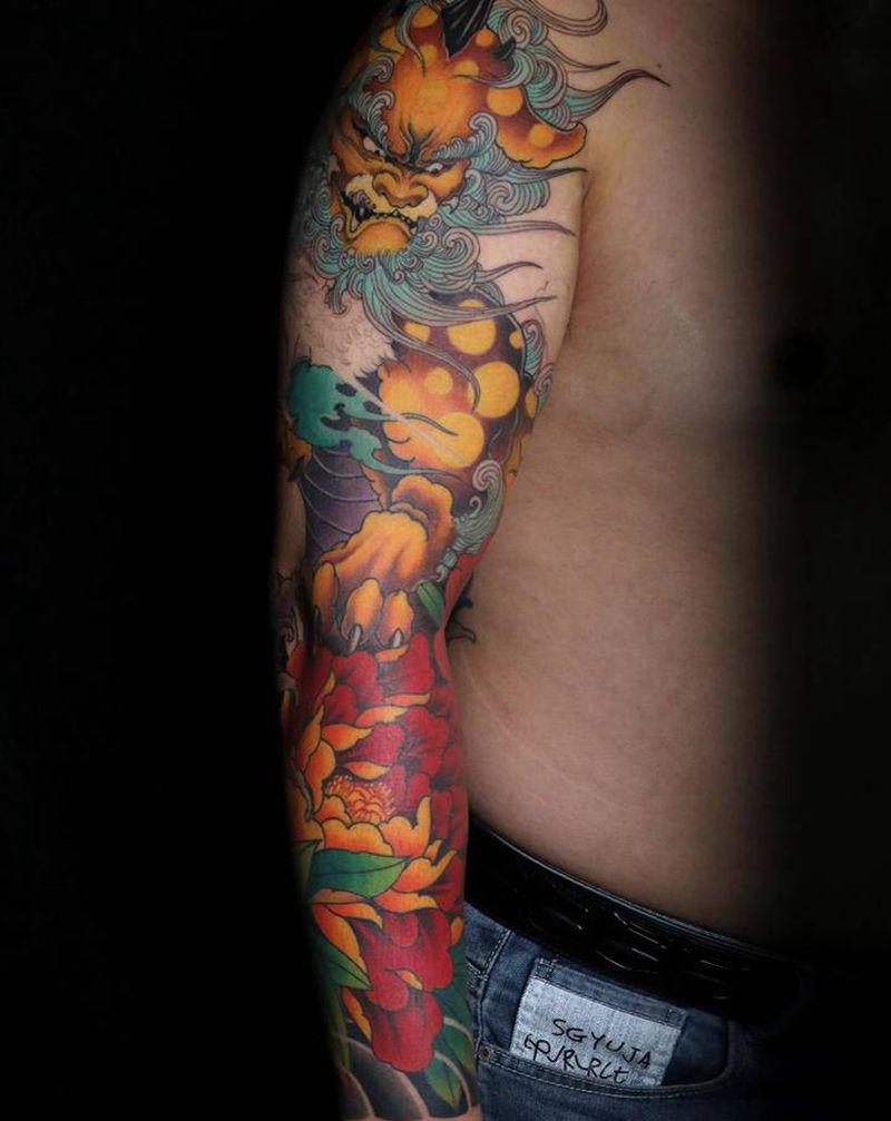 唐狮花臂80%纹身图片_手臂新传统纹身图案