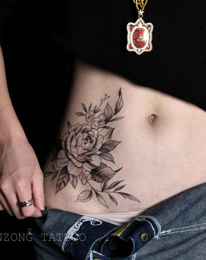 素花纹身图片_腹部点刺纹身图案