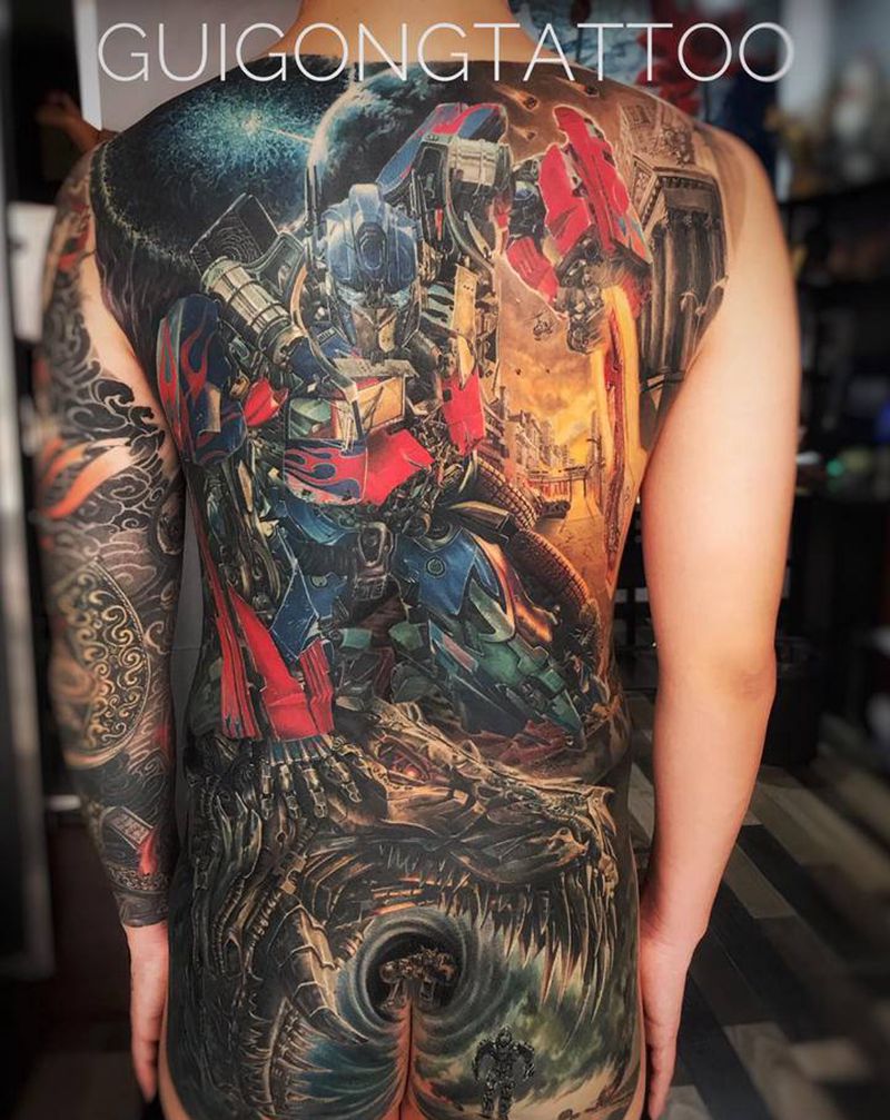 擎天柱纹身图片_臀部背部欧美写实纹身图案