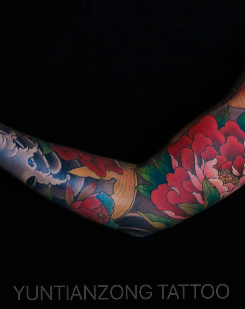 花臂鱼纹身图片_手臂新传统纹身图案