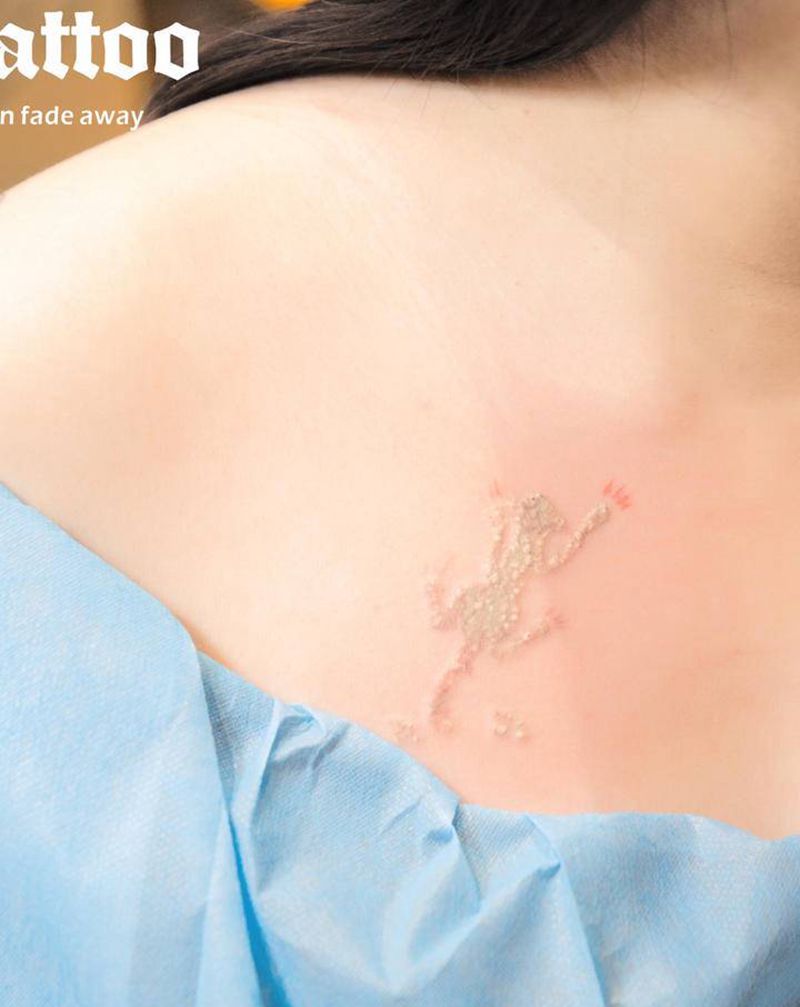 洗纹身效果纹身图片_颈部肩部纹身图案