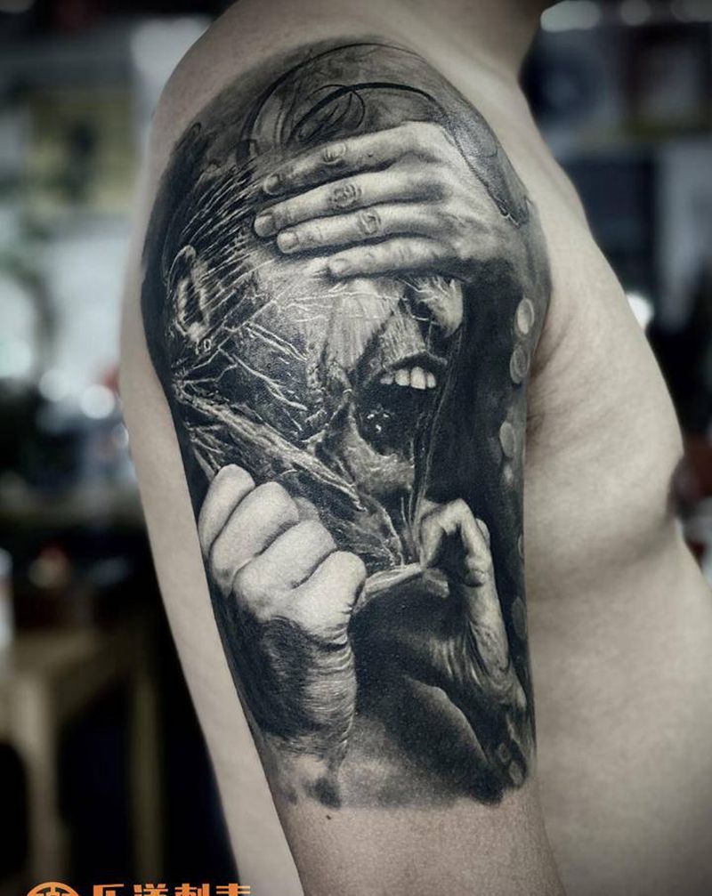 恢复后效果纹身图片_手臂肩部欧美写实乐道刺青纹身图案