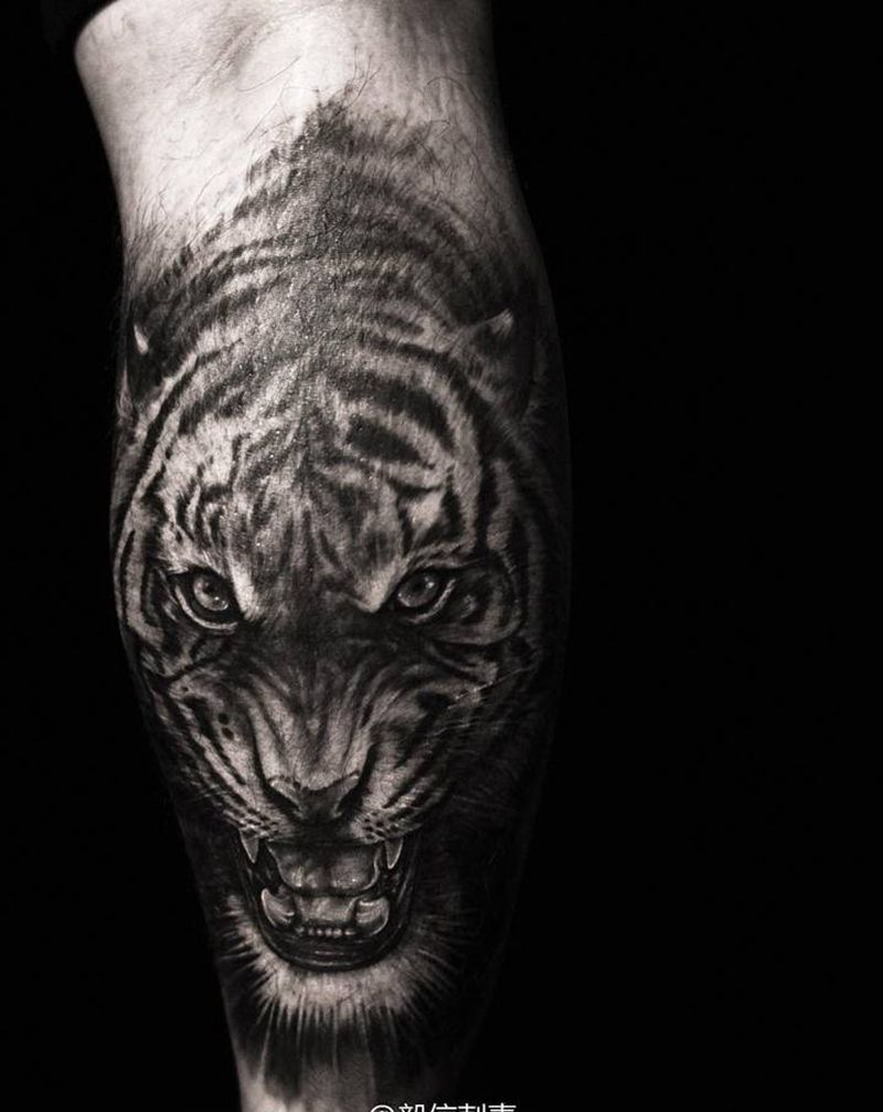 虎纹身图片_腿部欧美写实虎纹身图案