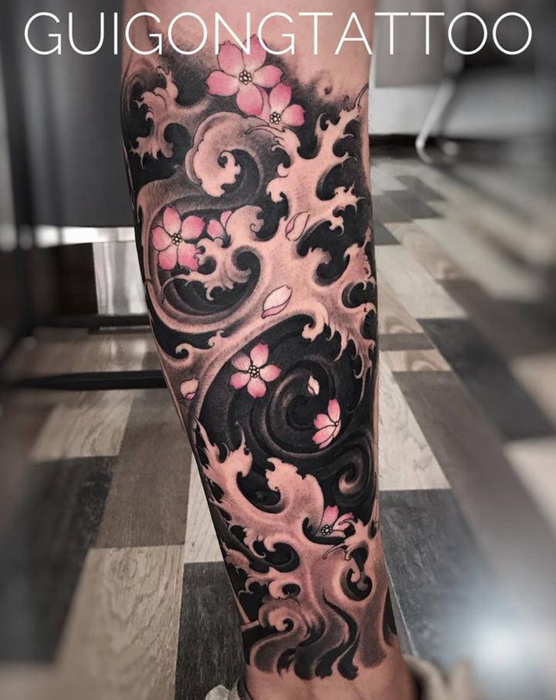 浪纹身图片_腿部新传统纹身图案