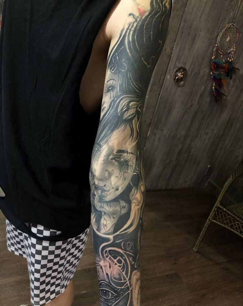 花臂纹身图片_手臂欧美写实纹身图案