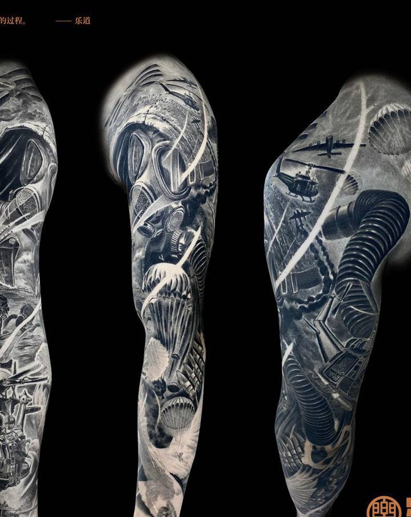 反战☮️花臂彩灰恢复后纹身图片_手臂肩部欧美写实花臂飞机坦克纹身图案