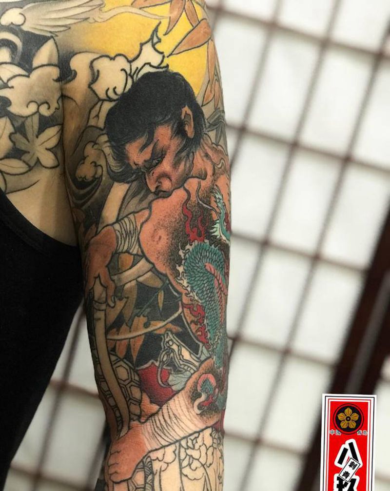 九纹龙纹身图片_手臂纹身图案