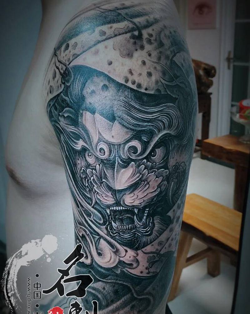 福狮纹身图片_手臂新传统纹身图案