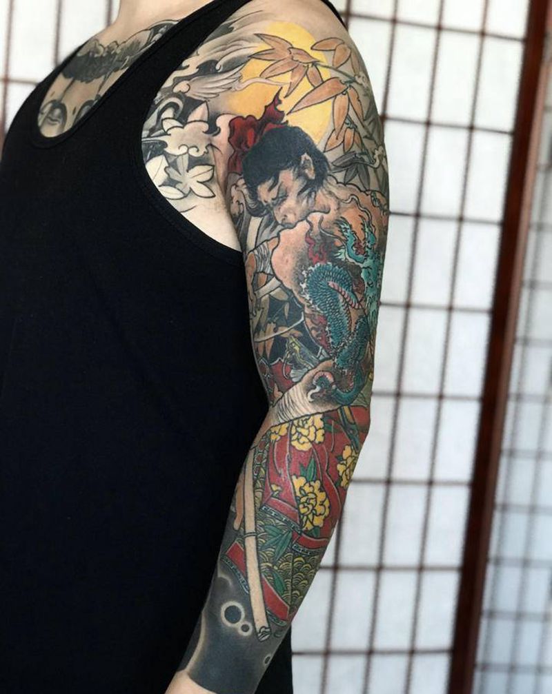 九纹龙花臂纹身图片_手臂新传统纹身图案