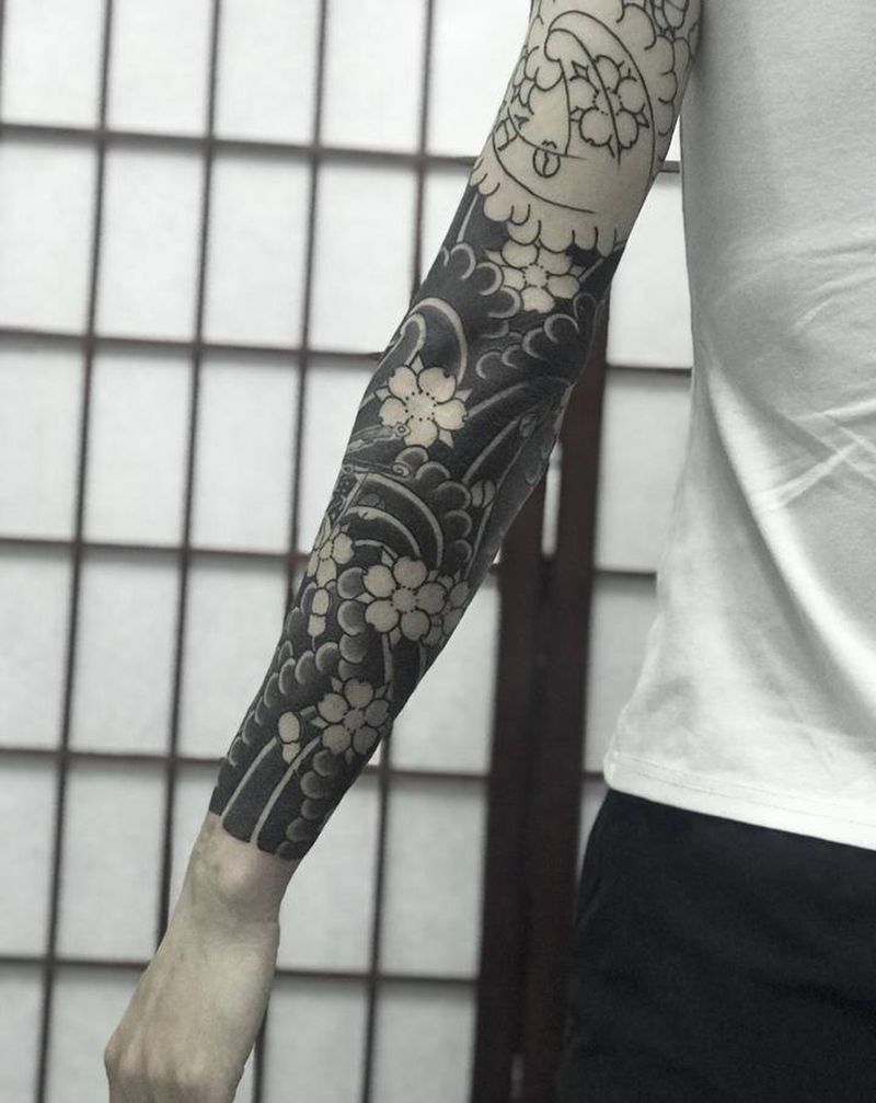 老传统樱花花臂未完纹身图片_老传统纹身图案