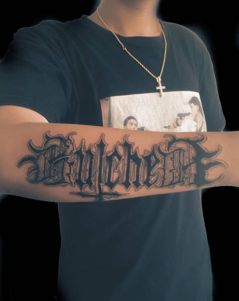 屠夫纹身图片_花体字纹身图案