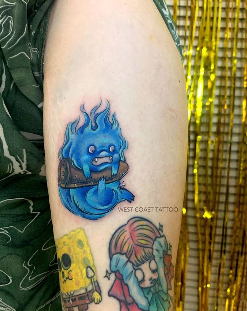 哈尔的移动城堡纹身图片_手臂New School卡通纹身图案