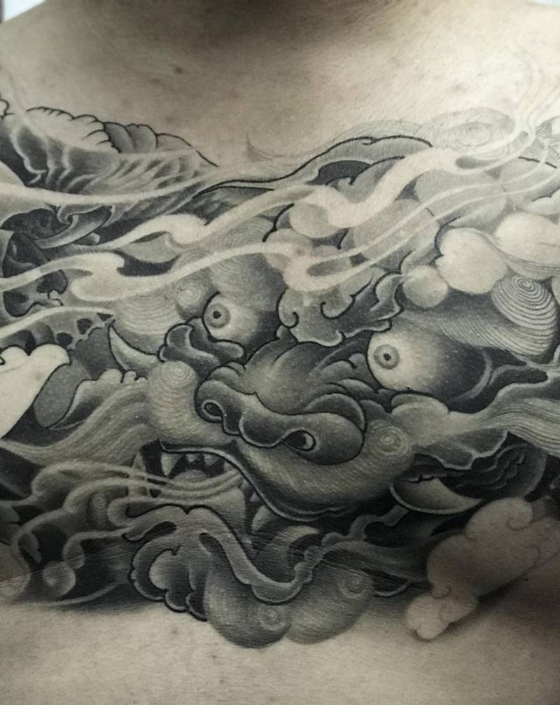 未完成纹身图片_胸部新传统纹身图案