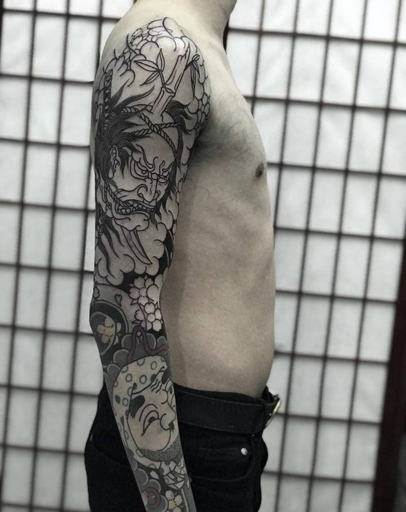 老传统生首花臂纹身图片_手臂老传统纹身图案