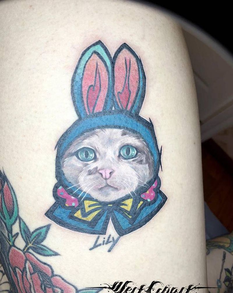 她的名字叫Lily纹身图片_腿部欧美写实叠彩纹身图案