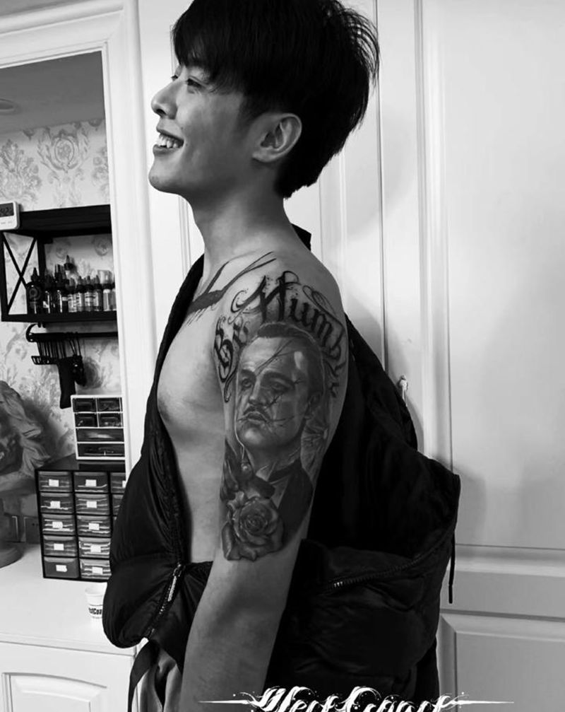 修改教父纹身图片_手臂欧美写实纹身图案