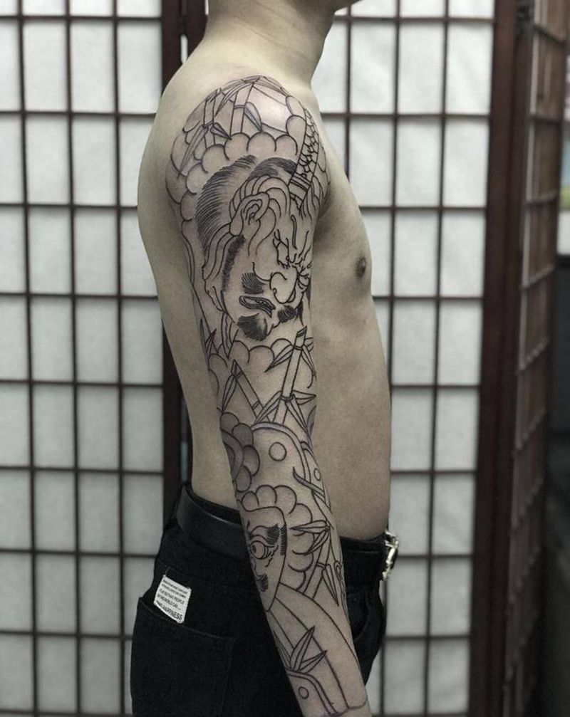 又一条生首花臂纹身图片_老传统纹身图案