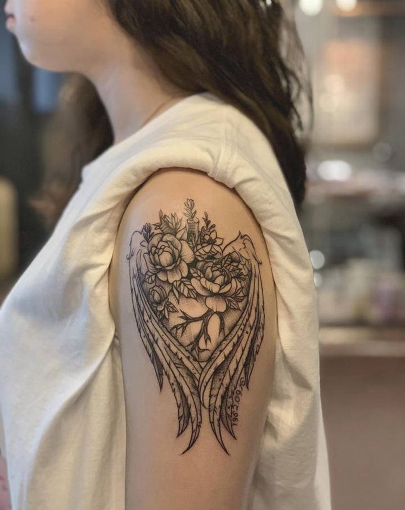 翅膀心脏纹身图片_手臂点刺纹身图案