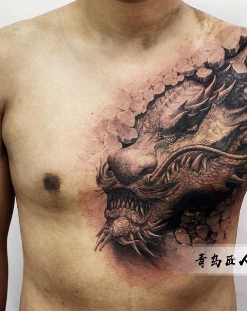 胸口 龙头纹身图片_胸部新传统欧美写实龙纹身图案