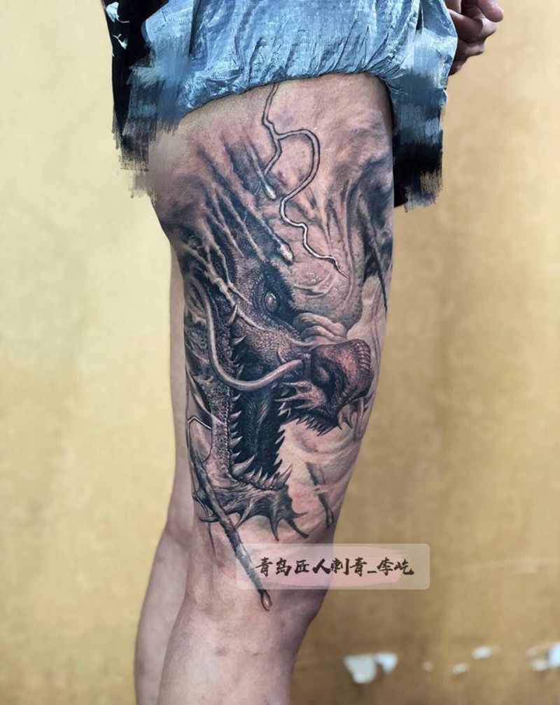 大腿龙头  龙纹身图片_腿部新传统欧美写实龙纹身图案