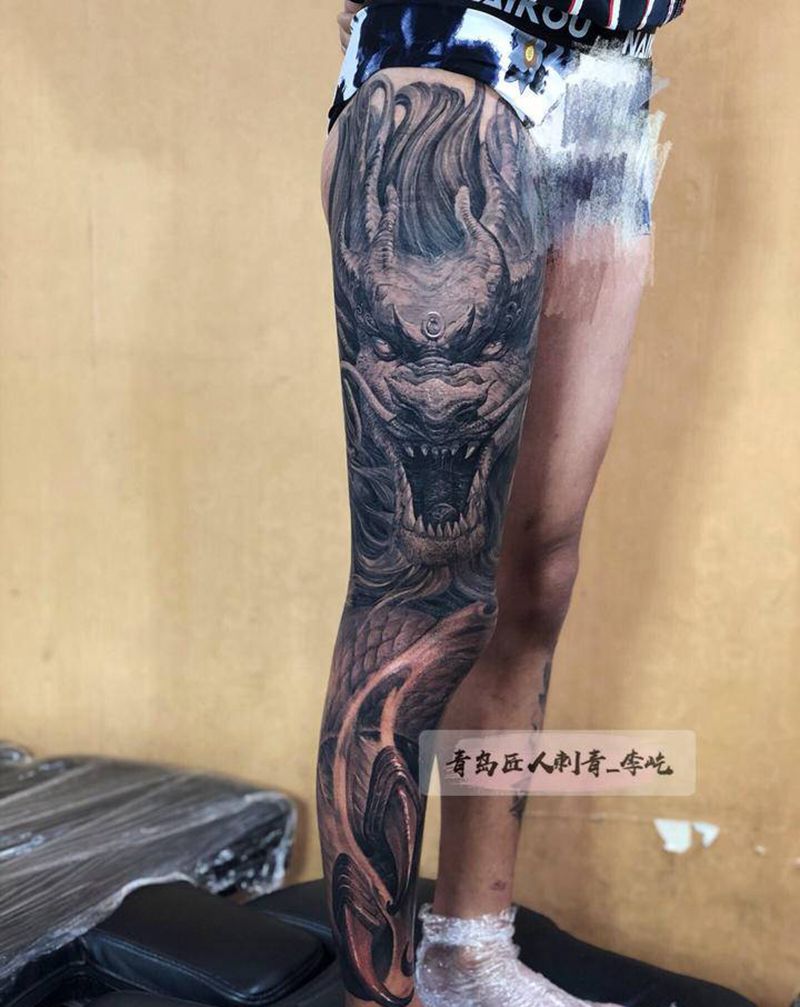 盘龙腿纹身图片_腿部新传统欧美写实龙纹身图案