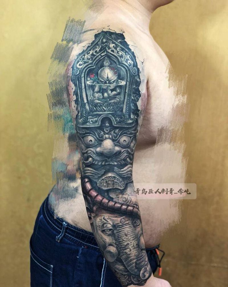 石雕机械臂纹身图片_手臂新传统欧美写实石雕机械纹身图案