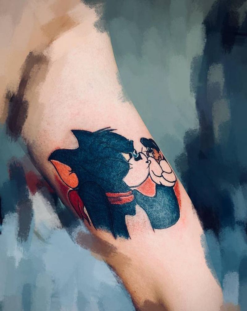 字母遮盖纹身图片_手臂汤姆杰瑞纹身图案