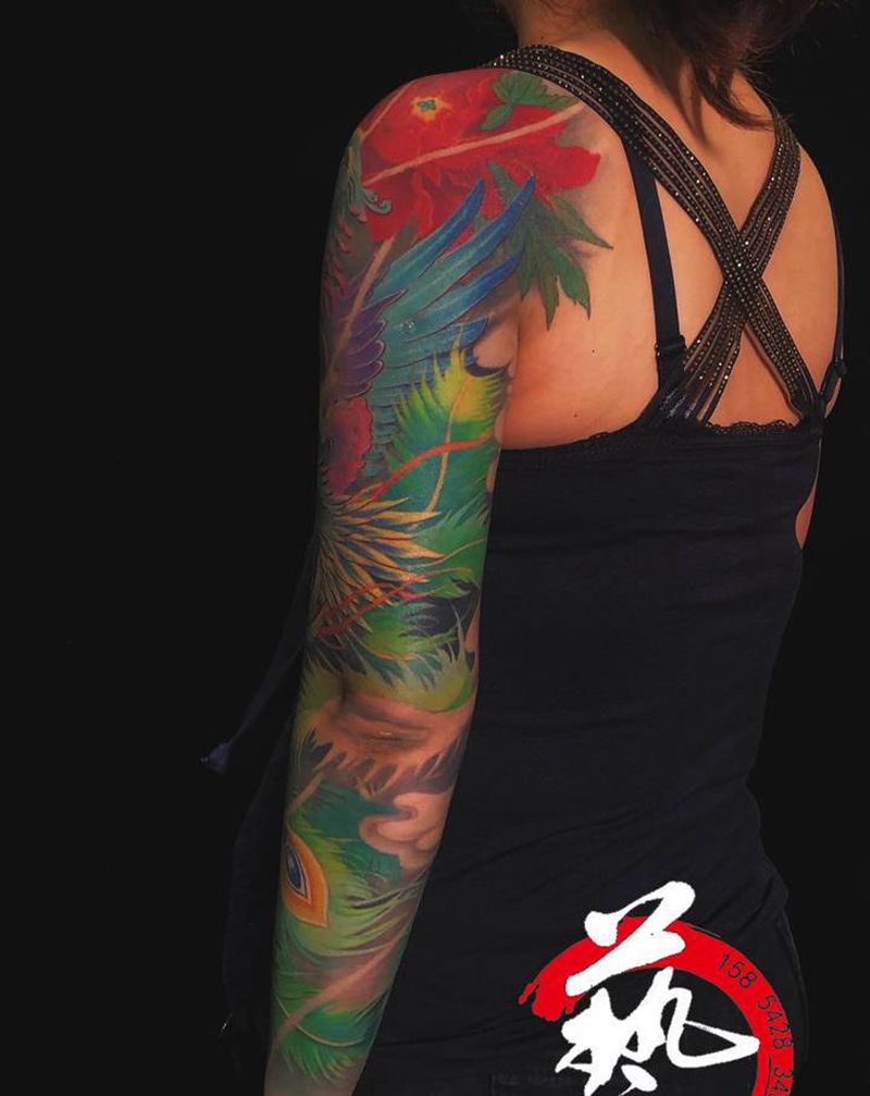 凤凰涅槃纹身图片_手臂新传统纹身图案