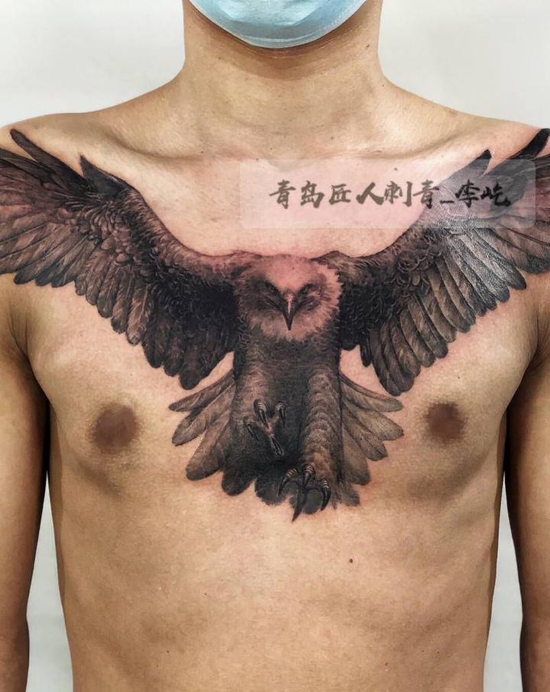 鹰 花胸纹身图片_胸部新传统欧美写实鹰花胸纹身图案