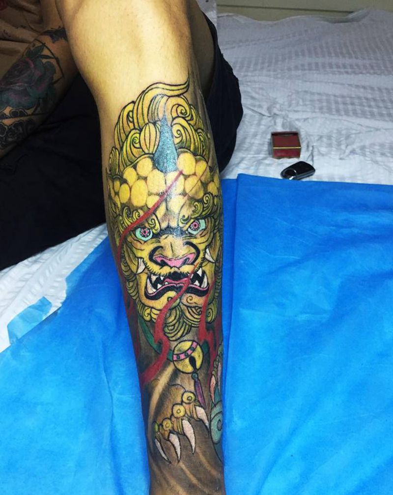 唐狮纹身纹身图片_腿部老传统纹身图案