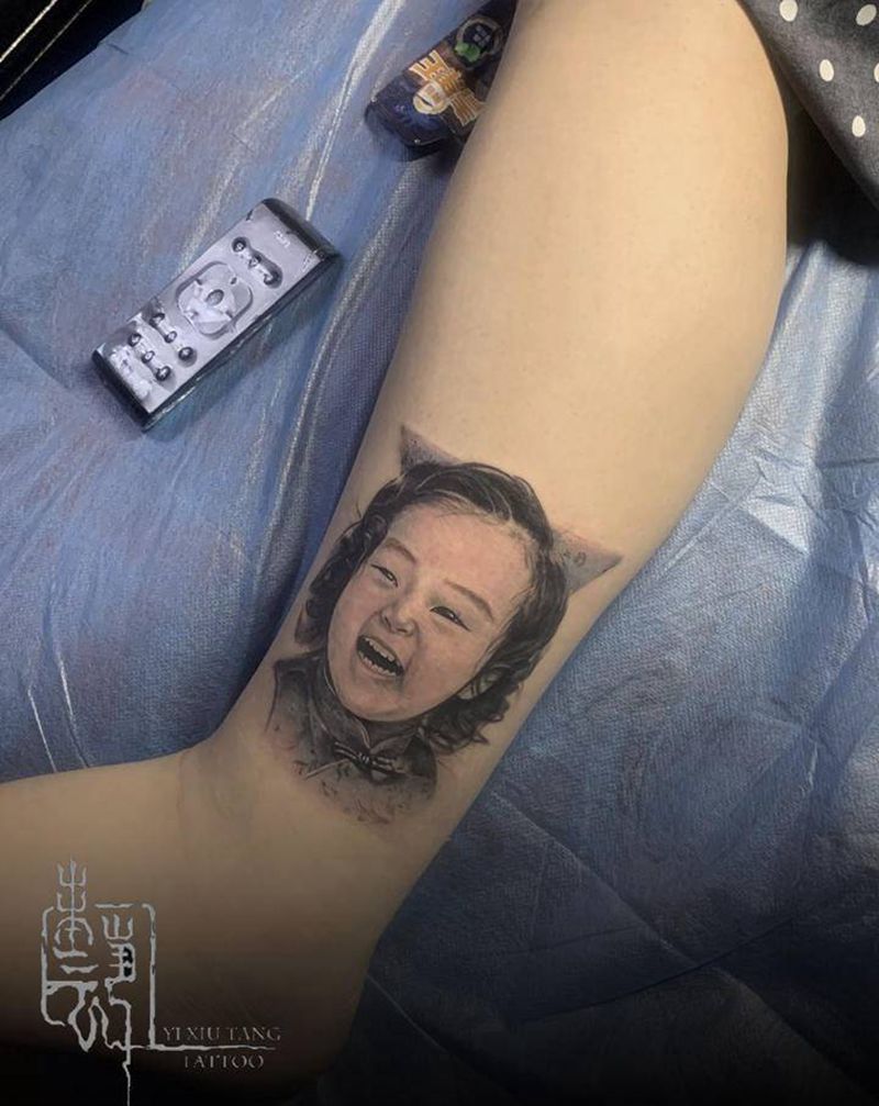 念纹身图片_手臂欧美写实人物纹身图案