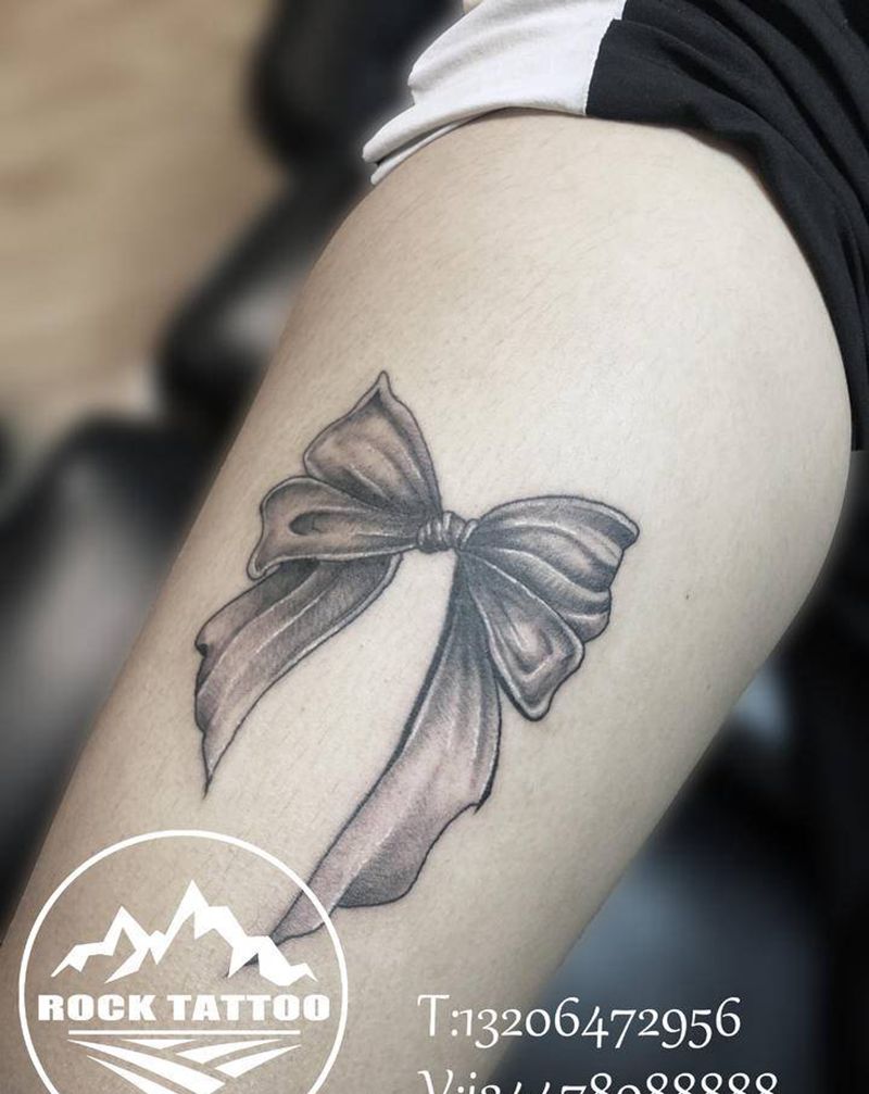 蝴蝶结纹身图片_腿部蝴蝶结纹身图案